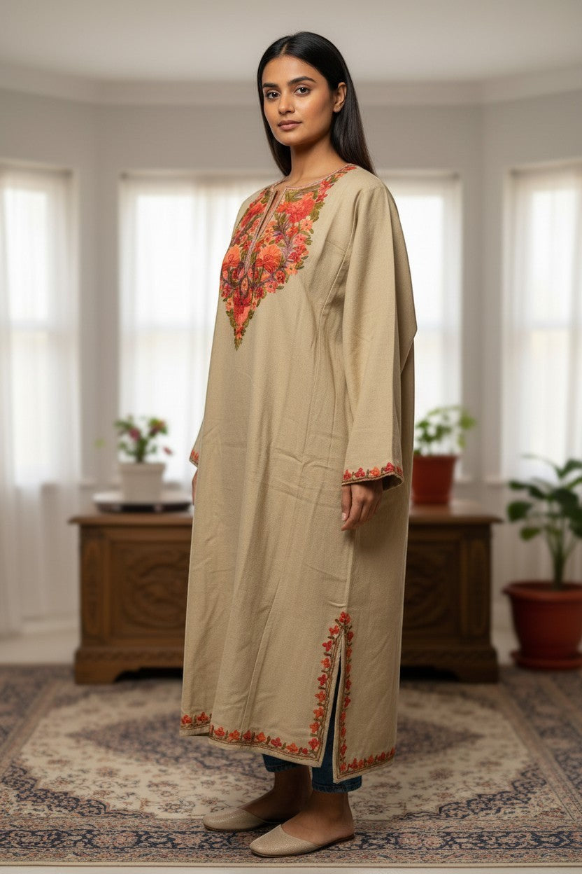 Kashmir Gallery beige woolen pheran with traditional Aari embroidery on neckline, cuffs, and hem. Long sleeves, crew neck, side slits.