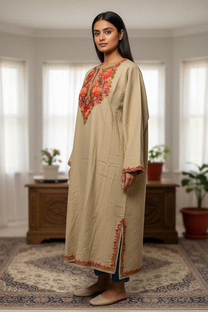 Kashmir Gallery beige woolen pheran with traditional Aari embroidery on neckline, cuffs, and hem. Long sleeves, crew neck, side slits.